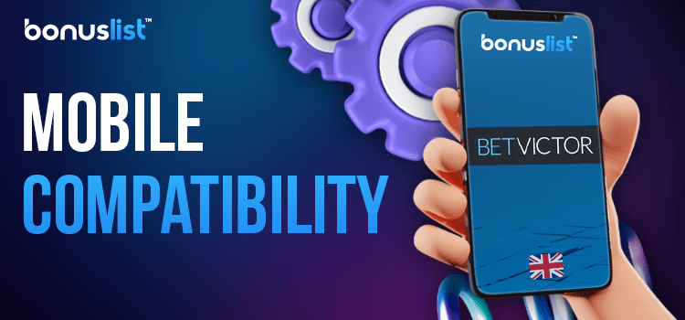 A hand is holding a mobile phone with the BetVictor mobile casino app